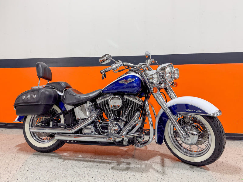 Harley-Davidson Motorcycle 2006 Harley-Davidson Softail Deluxe FLSTN, Leather Bags, Beautiful Chrome, and 8K Miles! $9,995