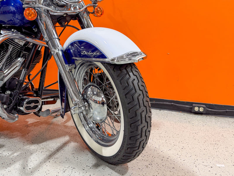 Harley-Davidson Motorcycle 2006 Harley-Davidson Softail Deluxe FLSTN, Leather Bags, Beautiful Chrome, and 8K Miles! $9,995