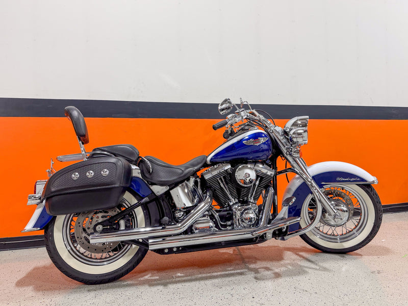 Harley-Davidson Motorcycle 2006 Harley-Davidson Softail Deluxe FLSTN, Leather Bags, Beautiful Chrome, and 8K Miles! $9,995